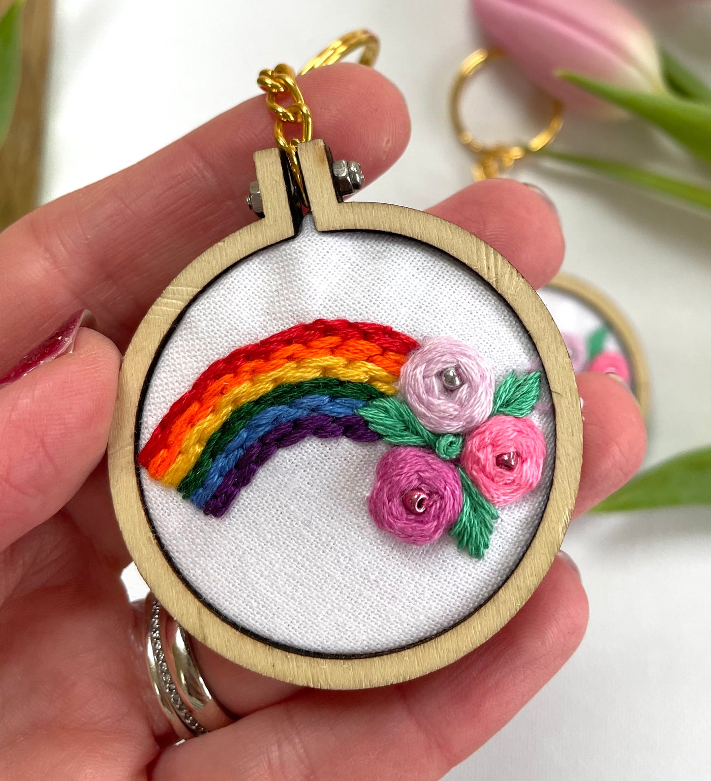 Rainbow flower burst keyring